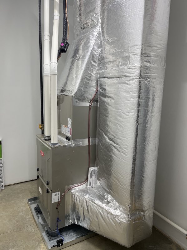 Indoor Bryant air handler and insulated ductwork