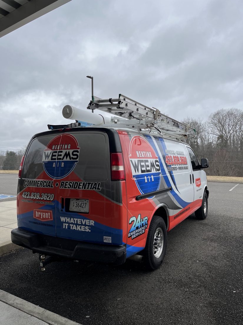 Branded Weems Heating and Air service van